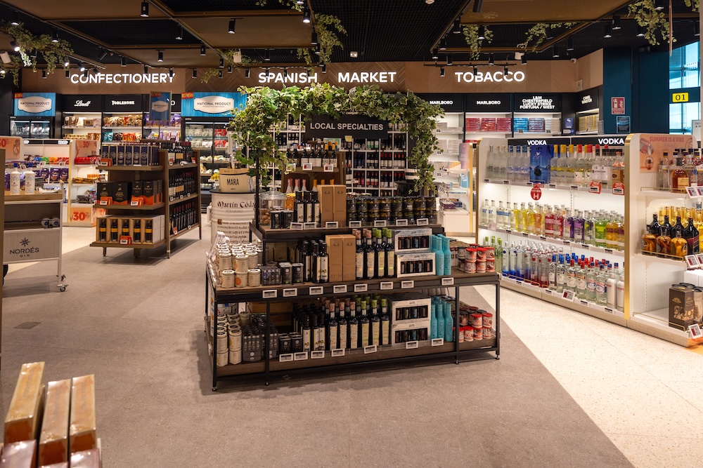 Duty free shop offering various products including confectionery, tobacco, and local spanish specialties